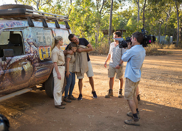 Irwins in front of a camerman.