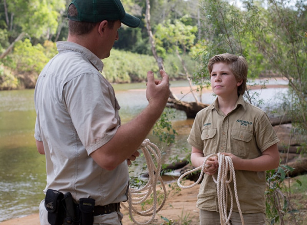 Robert Irwin with a zoo employee.